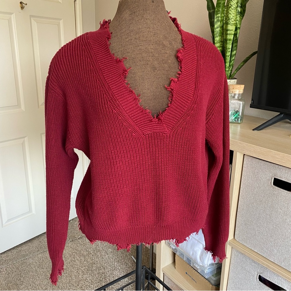 Forever 21 size medium sweater burgundy with rough fringe, and V-neck
